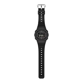 Casio black digital watch with square face, rubber strap, and silver-tone buckle clasp