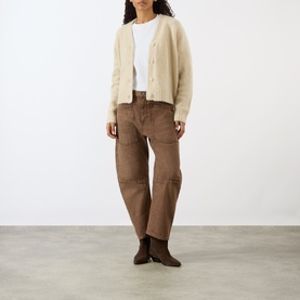 Model wearing Nili Lotan Beige Melange cardigan with white tee, brown wide-leg trousers and brown ankle boots.