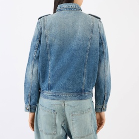 Model wearing Nili Lotan denim jacket in Rosebowl Wash, rear view, with matching wide-leg denim trousers.