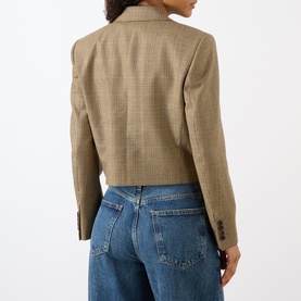 Model wearing Nili Lotan Glen Tan cropped check blazer, back view, styled with blue wide-leg jeans.