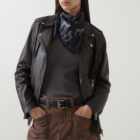 Model with Nili Lotan Cheetah Silk Twill Scarf in cheetah print, worn at neck, styled with black leather biker jacket and brown trousers