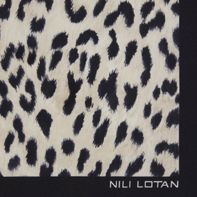 Nili Lotan scarf in cheetah print, cream and black leopard-spot pattern with solid black border edge