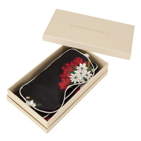 Olivia von Halle Rene silk eye mask in black with red and white floral print, presented in branded gift box