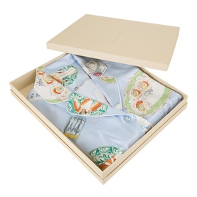 Olivia von Halle Cadiz silk pyjamas in pale blue with ornate print, neatly folded in an open gift box