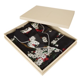 Olivia von Halle Lila Ren&eacute; Blossom Silk Pyjama Set in black floral print, folded and presented in a cream gift box