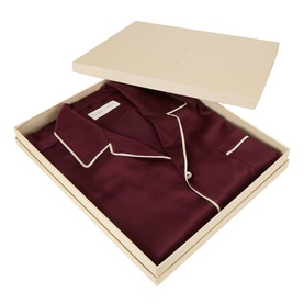 Olivia von Halle Yves Silk Pyjama Set in Raisin, folded in cream gift box, featuring ivory contrast piping on collar and placket.
