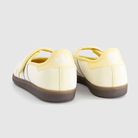 Adidas Samba Almost Yellow leather trainers, rear view, white stripes, dark gum sole