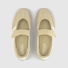 Adidas mary jane shoes in dual yellow and white, top-down view showing velcro strap, logo insole and gum sole detail