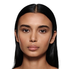 Model wearing Victoria Beckham Posh Gloss in Bikini, a sheer nude-pink lip gloss finish shown in a close-up beauty face shot.