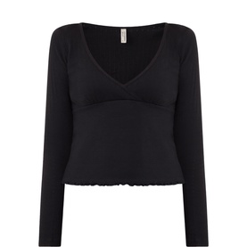 Desmond & Dempsey Plain Black cotton PJ top with V-neck, long sleeves, and lettuce-edge hem detail