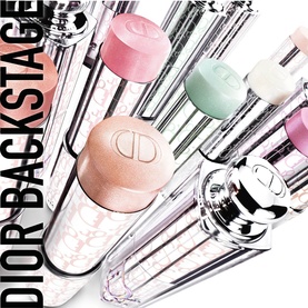 Dior Backstage Glassy Glow Sticks in assorted shades including Glazed Pink, displayed fanned out showing silver packaging and coloured caps