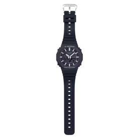 Casio black resin G-Shock style watch with dual-dial face, silver buckle, and textured strap