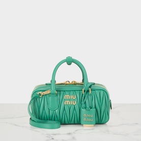 Miu Miu matelass&eacute; calfskin crossbody bag in Mango green with gold-tone logo lettering, top handles and detachable shoulder strap