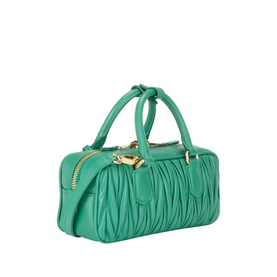 Miu Miu matelass&eacute; calfskin crossbody bag in mango green with gold-tone hardware, zip top, and knotted top handles