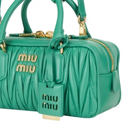 Miu Miu matelass&eacute; calfskin crossbody bag in mango green with gold-tone logo lettering, zip top, and branded charm tag