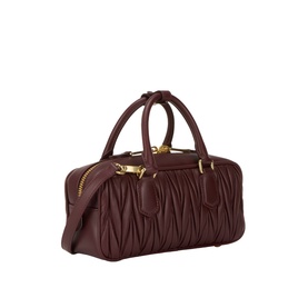 Miu Miu bordeaux quilted leather crossbody bag with gold-tone hardware, dual top handles and detachable shoulder strap
