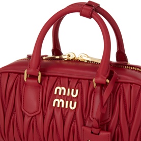 Miu Miu Arcadie Matelass&eacute; Top Handle Bag in Rosso red leather, gold-tone logo lettering and hardware, twin top handles with keeper loop visible.