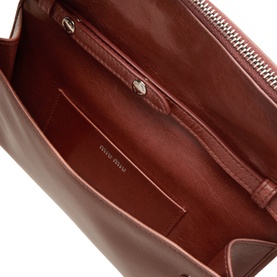 Miu Miu calfskin leather crossbody bag in Antico, interior view showing card slots, zip pocket and silver-tone hardware