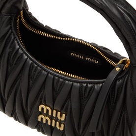 Miu Miu Wander Matelass&eacute; Crossbody Bag in Nero, open top view showing black quilted lambskin interior, gold-tone zip and logo hardware