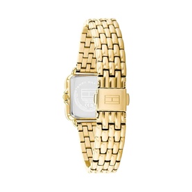 Tommy Hilfiger gold-tone watch, rear view showing branded caseback and gold-tone bracelet strap with rectangular links.