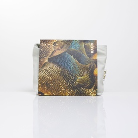 Voya bodycare gift set in decorative gold and teal wave-print pouch with grey lining