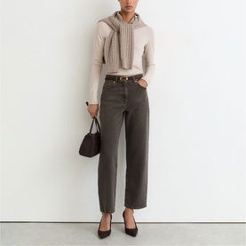 Model wearing Reiss mushroom brown barrel-leg jeans with beige knit top and scarf, styled with black heels and dark tote bag