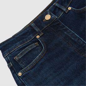 Reiss dark blue denim jeans close-up showing waistband, coin pocket, and gold-tone button and stud detailing