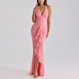 Model wearing House of CB raspberry halterneck maxi dress with deep V-neck, ruched bodice and asymmetric ruffle hem detail