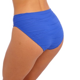 Model wearing Fantasie Bikini Brief in Ultramarine, high-waist style with ruched texture detail, back view