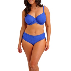 Model wearing Fantasie bikini top in Ultramarine, paired with matching ruched bikini briefs with side tie detail