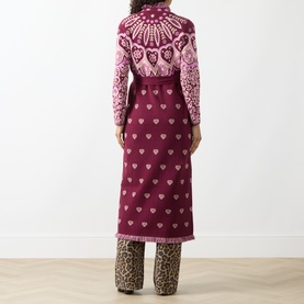 Model wearing Hayley Menzies Dalton Bandana Print Duster Cardigan in burgundy, maxi length with heart motifs, styled with leopard print trousers