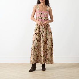 Model wearing Hayley Menzies Talitha Silk Leopard Dress in multi, square neckline, wide straps, button placket, maxi length, styled with brown ankle