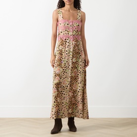 Model wearing Hayley Menzies Talitha Silk Leopard Dress in multi; leopard and rose print maxi with button placket, lace trim, styled with brown ankle