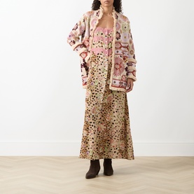 Model wearing Hayley Menzies Talitha Silk Leopard Dress in multi, styled with a pink floral jacket and brown ankle boots.