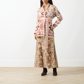 Model wearing Hayley Menzies ecru floral cotton cardigan with belted waist, styled with leopard-print maxi skirt and dark ankle boots
