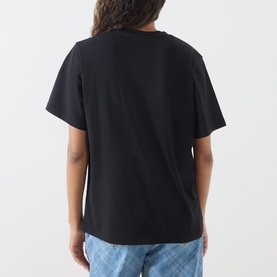 Model wearing Hayley Menzies black cotton T-shirt, back view, styled with light blue jeans.