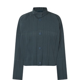 Issey Miyake dark green casual shirt with mandarin collar, button front, and pleated detailing, long sleeves, cropped fit