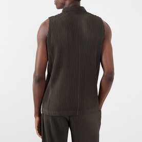 Model wearing Issey Miyake Brown Pleated Polo Shirt, sleeveless with polo collar, back view. Styled with matching brown pleated trousers.