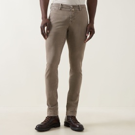 Model wearing Jacob Cohen Bobby Slim Leg Chinos in Elephant Grey, slim cut, styled with brown leather lace-up boots