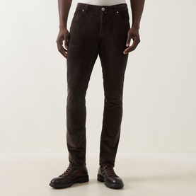 Model wearing Jacob Cohen Bard Corduroy Straight Leg Trousers in brown, styled with dark leather lace-up boots.