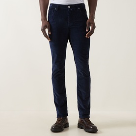 Model wearing Jacob Cohen Bard Corduroy Straight Leg Trousers in Night Blue, styled with brown leather lace-up boots