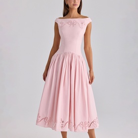 Model wearing House of CB pink off-shoulder midi dress with floral embroidery detail and full pleated skirt with cutwork hem