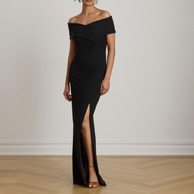 Model wearing Lauren black off-shoulder maxi dress with front thigh split, styled with strappy heeled sandals