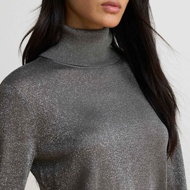 Model wearing Lauren black and silver metallic lurex roll-neck knit sweater, close-up of neckline and torso