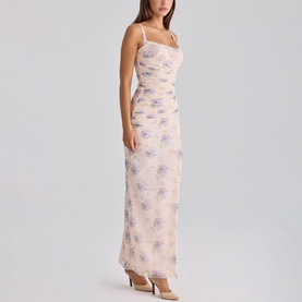 Model wearing House of CB Ivory Peony Print maxi dress with spaghetti straps, square neckline and fitted silhouette with floral print throughout.