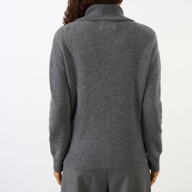 Model wearing Lisa Yang The Denie Knit Cardigan in Graphite, back view showing flat extended collar, long sleeves and ribbed trims