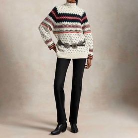 Model wearing Polo Ralph Lauren cream multi Fair Isle knit sweater with black trousers and ankle boots