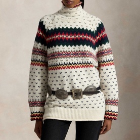 Model wearing Polo Ralph Lauren Cream Multi fair isle turtleneck knit, styled with a brown leather belt and black trousers.