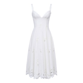 House of CB white sleeveless midi dress with V-neckline, floral cutwork hem detail, and fitted bodice with full skirt