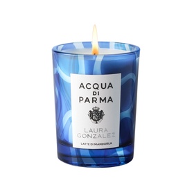 Acqua Di Parma Laura Gonzalez Latte di Mandorla candle in blue marbled glass vessel with lit flame